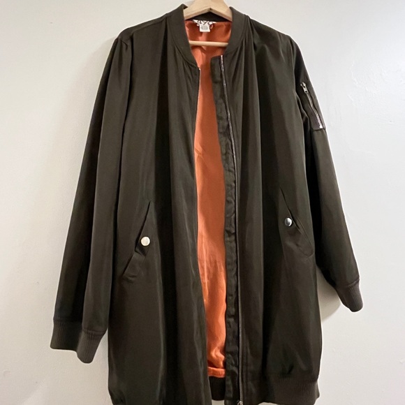 olive green jacket with orange inside - Picture 1 of 7
